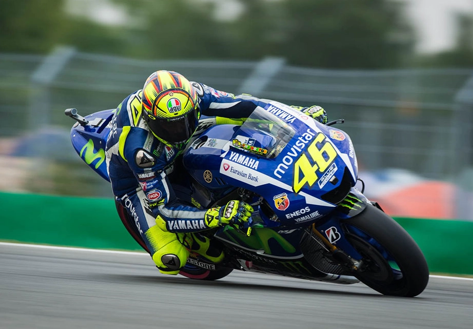 Valentino Rossi trail braking into a corner
